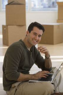 Portrait of businessman in new office.