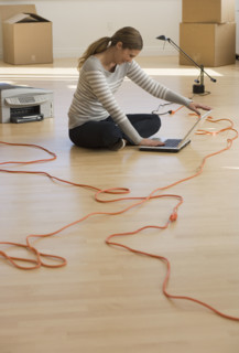 Businesswoman working in new office.