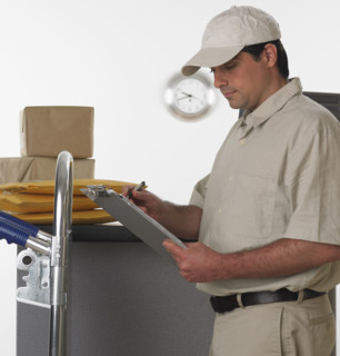 Deliveryman with clipboard and hand truck.