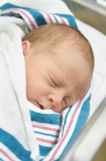 Close up of newborn baby sleeping.