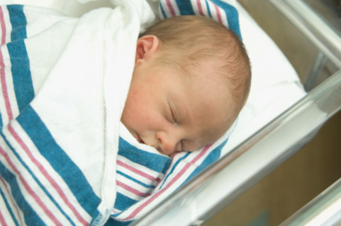 Close up of newborn baby sleeping.