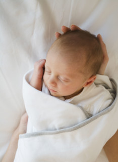 Close up of newborn baby sleeping.