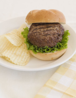 Close up of hamburger on plate.