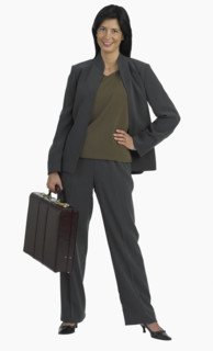 Studio shot of businesswoman holding briefcase.