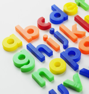 Close up of alphabet magnets.