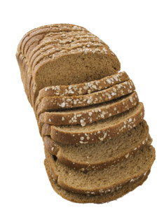 Close up of sliced loaf of bread.