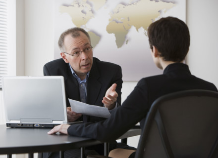 Businessman and businesswoman having meeting.