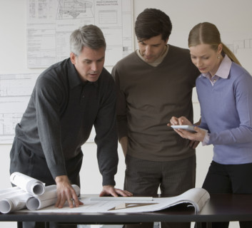 Businesspeople in architect’s office.