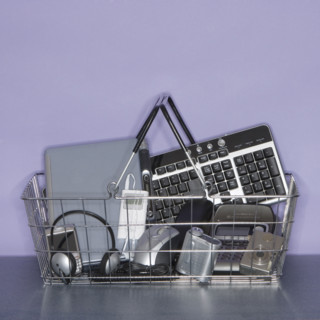 Shopping basket filled with electronics.