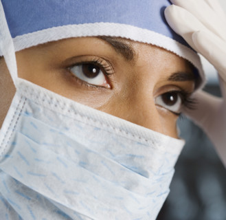 Indian female doctor wearing surgical mask.