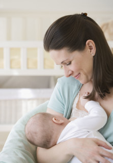 Mother breastfeeding baby.