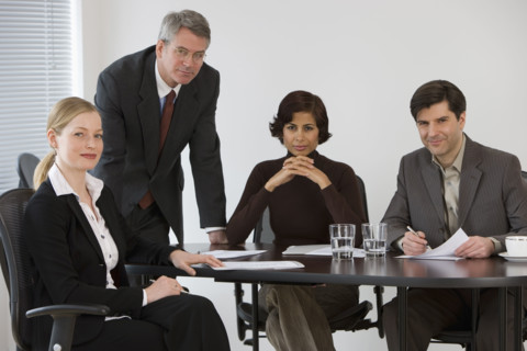 Group of businesspeople in meeting.