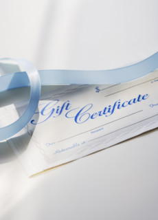 Close up of gift certificate and ribbon.