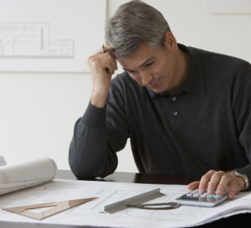 Male architect working at desk.