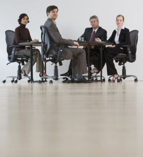 Group of businesspeople having meeting.