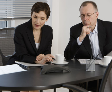 Businesspeople having teleconference.