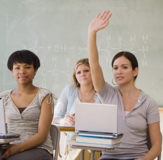 Ethnic-ethnic women in classroom.