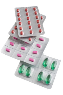 Assorted medication in bubble packs.