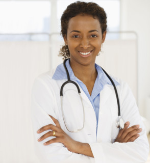 Portrait of female doctor with arms crossed.