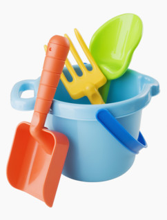 Close up of toy pail and shovels.