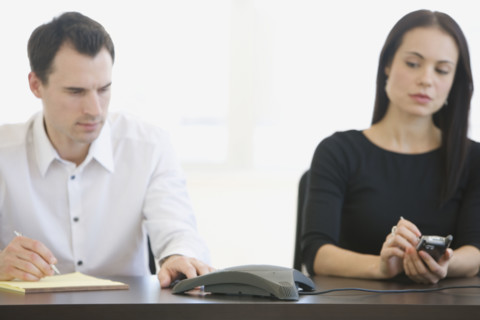 Businesspeople having teleconference.