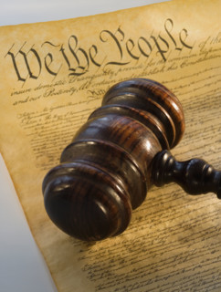 Judge’s gavel on the Constitution.