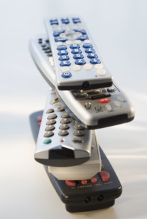 Stack of remote controls.