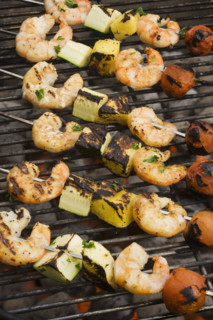 Shish kebab cooking on grill.
