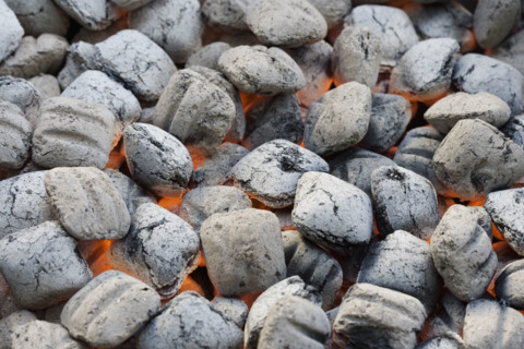 Close up of charcoal briquette fire.