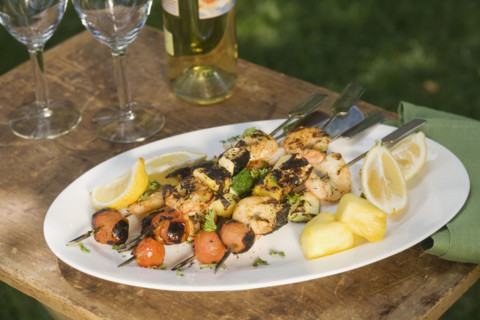 Grilled shish kebab on platter.