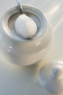 Spoon on sugar bowl.