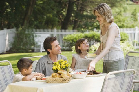 Family eating outdoors.