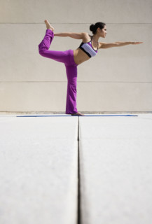 Woman practicing yoga.