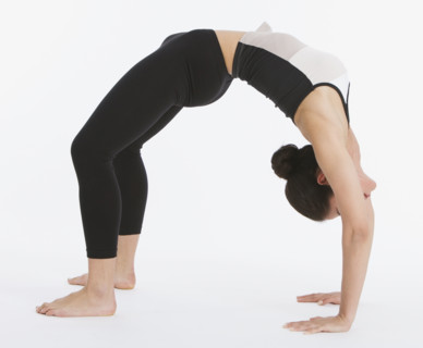 Woman practicing yoga.