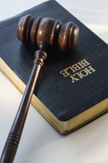 Judge’s gavel on bible.