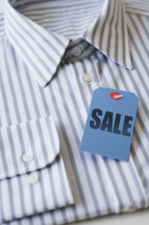Sale tag on men’s shirt.