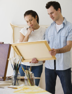 Couple looking at artwork.