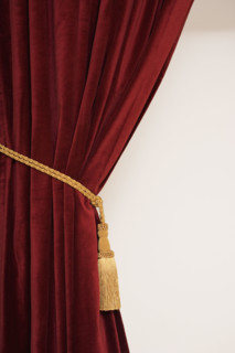 Close up of curtain and tieback.
