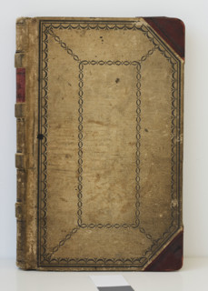 Cover of old ledger book.