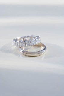 Close up of engagement and wedding rings.