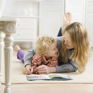 Mother and child reading. Date : 2006