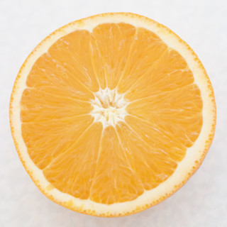 Close up of orange half. Date : 2006