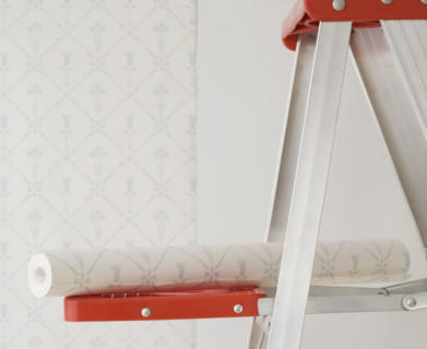 Roll of wallpaper on ladder shelf. Date : 2006