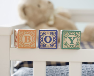 Boy spelled out with blocks on crib. Date : 2007