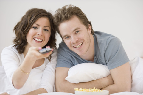 Couple watching television. Date : 2007