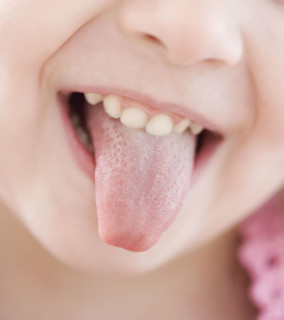 Close up of girl sticking out tongue. Date : 2007