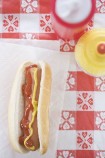 High angle view of hot dog with ketchup and mustard. Date : 2006