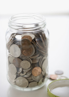 Close up of mason jar with change. Date : 2006