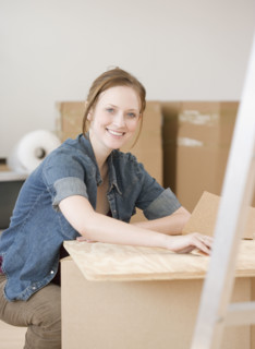 Portrait of woman in new house. Date : 2006