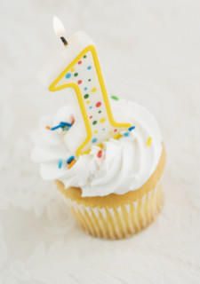 Still life of cupcake with one candle. Date : 2006